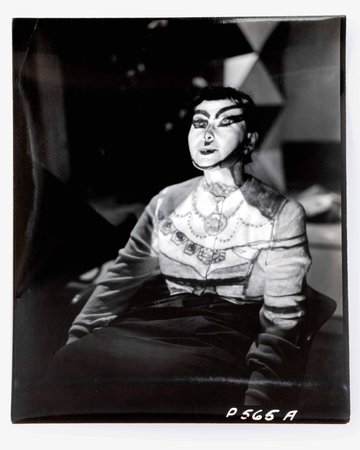 Photograph of Steinberg Drawing Projected onto Hedda Sterne Tilting Face