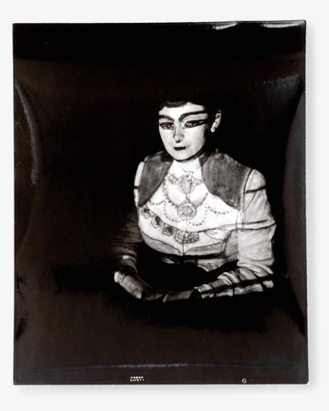 Photograph of Steinberg Drawing Projected onto Hedda Sterne with Hands in Lap