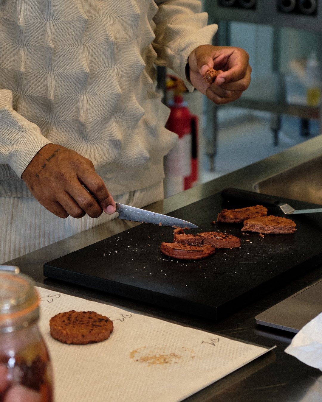 Food scientist, fermenter, and former Noma chef, David Zilber cooking inside his lab in Hørsholm, Denmark.