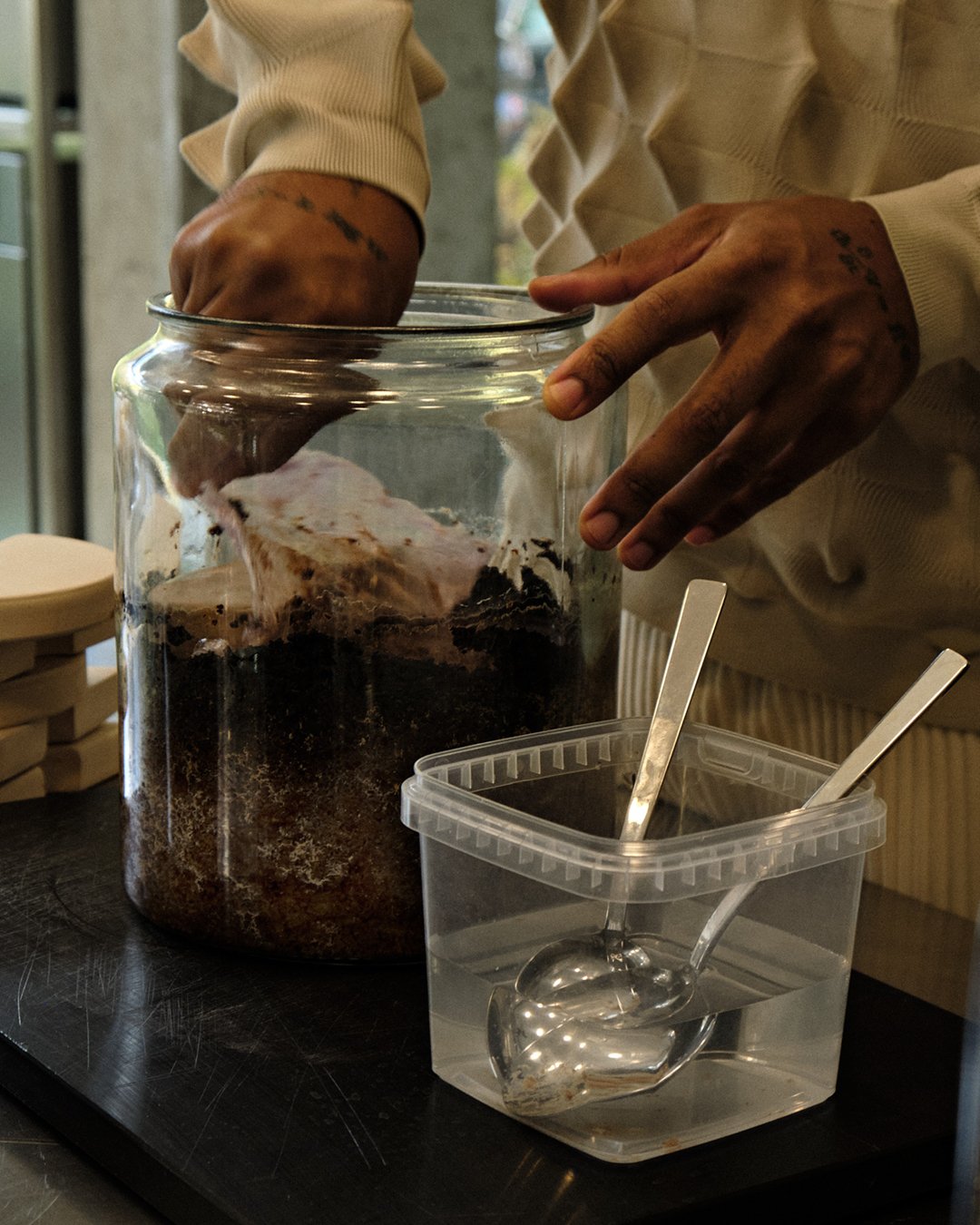 Close up of food scientist, fermenter, and recipe developer David Zilber working on recipes and fermentation techniques.