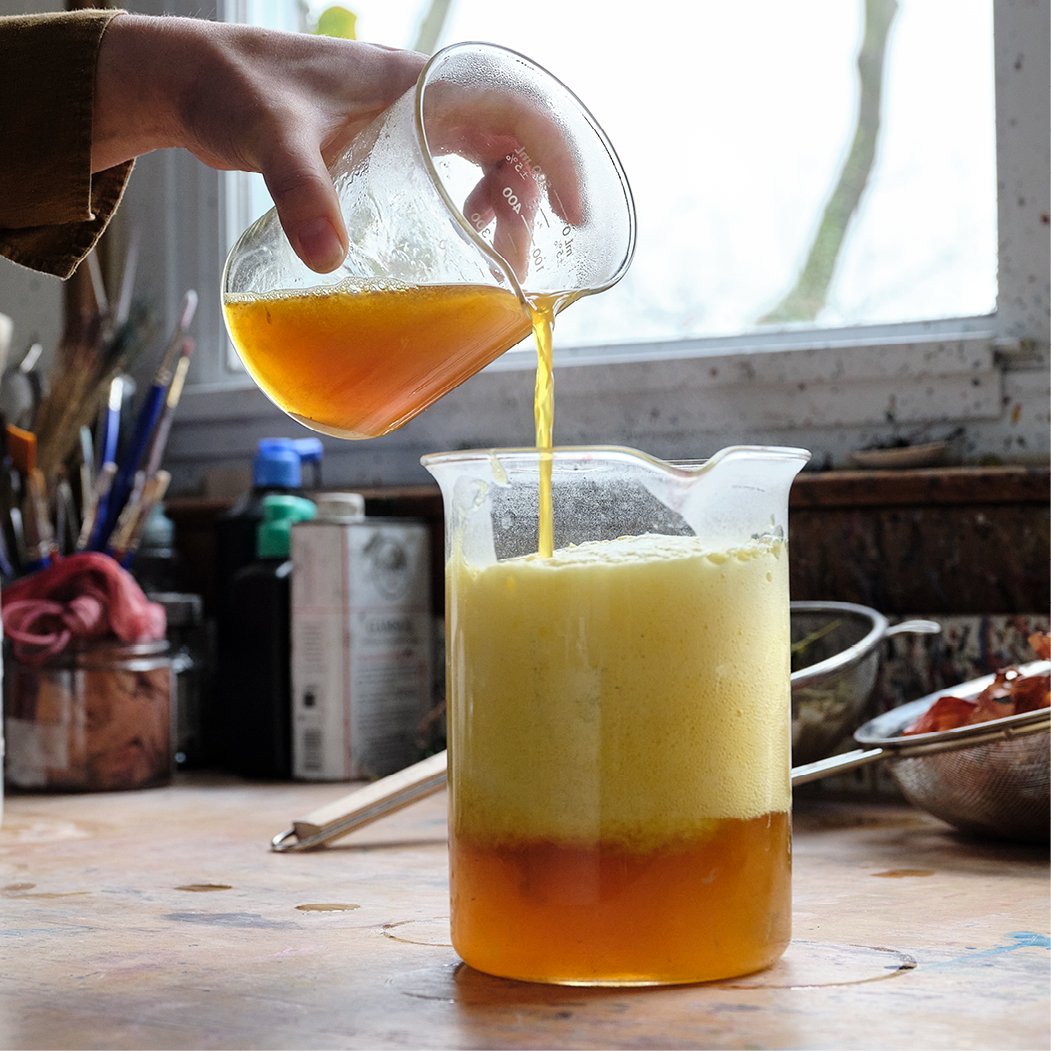 Once she has a solution of the dye, abstract artist Natalie Stopka precipitates weld lake pigment from the liquid.