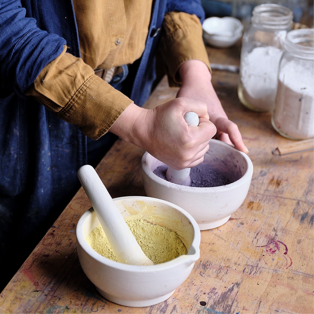 After precipitating the pigment, abstract artist Natalie Stopka washes it to remove impurities, then dries and grinds it; shown here are dried weld and logwood lake pigments.