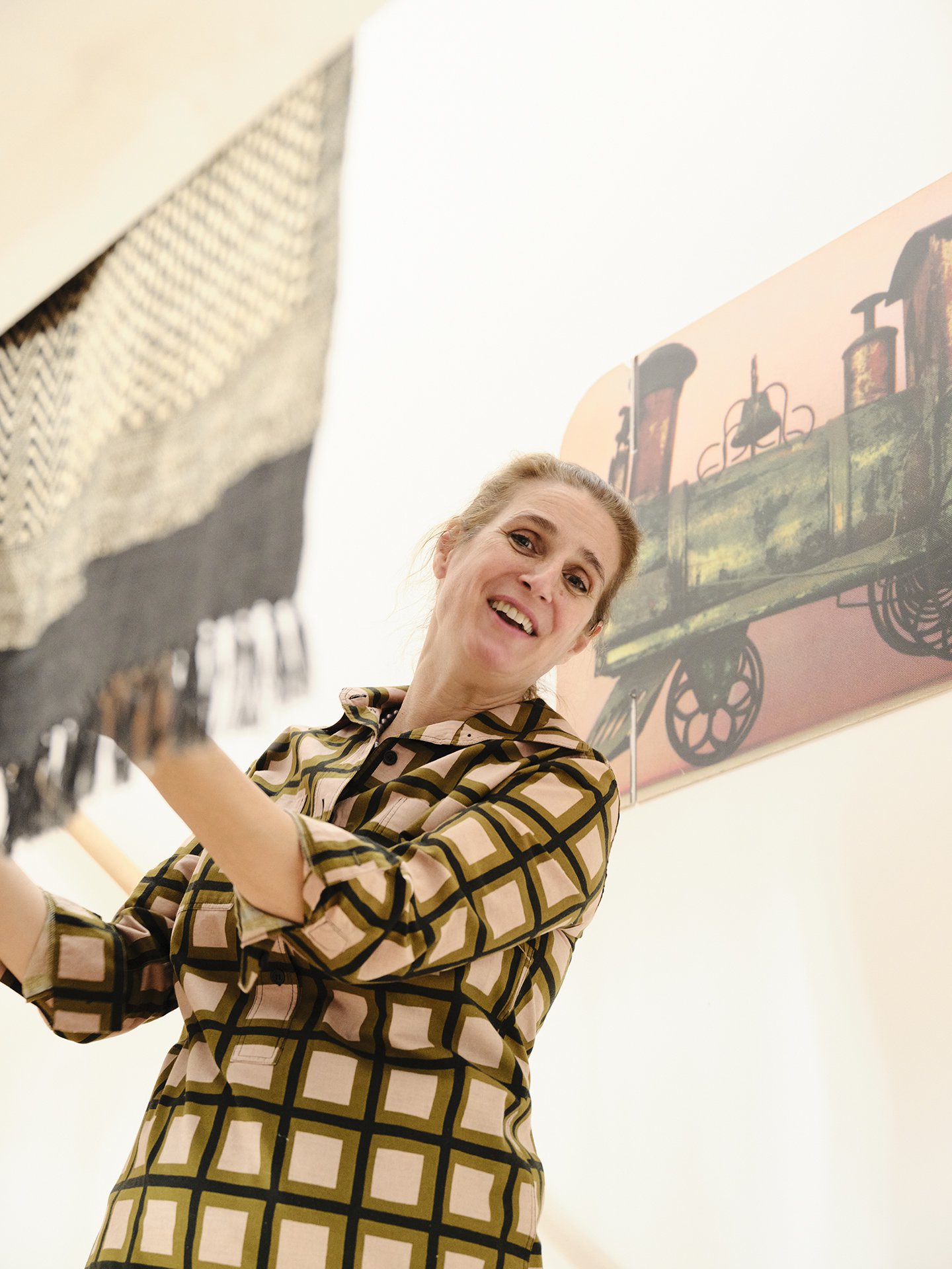 Llisa Demetrios, Chief Curator of the Eames Institute, standing in the interior of the Eames Ranch.