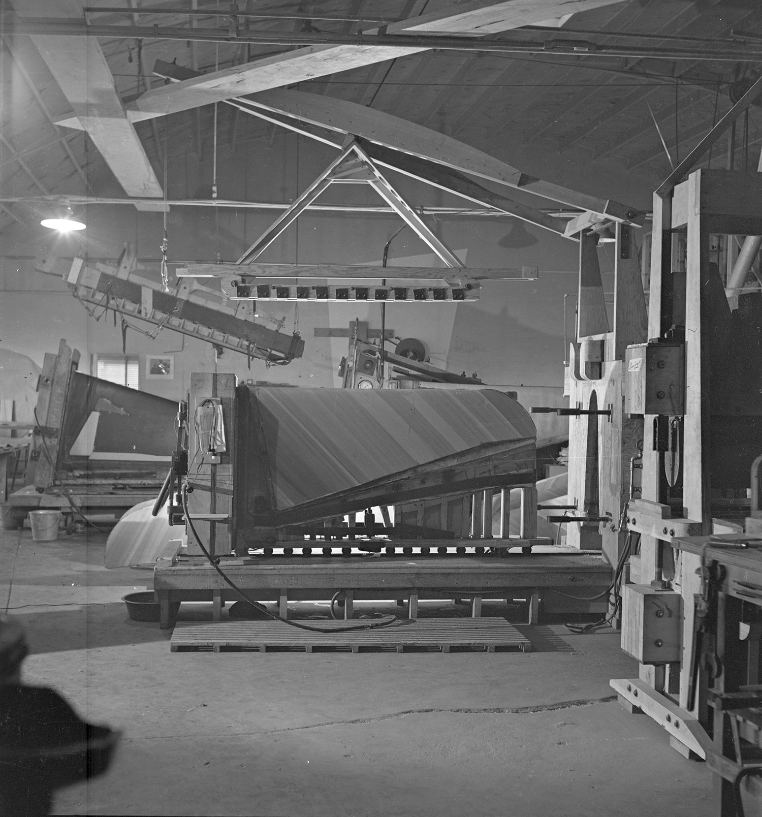 Interior view of molded plywood airplane parts in production.