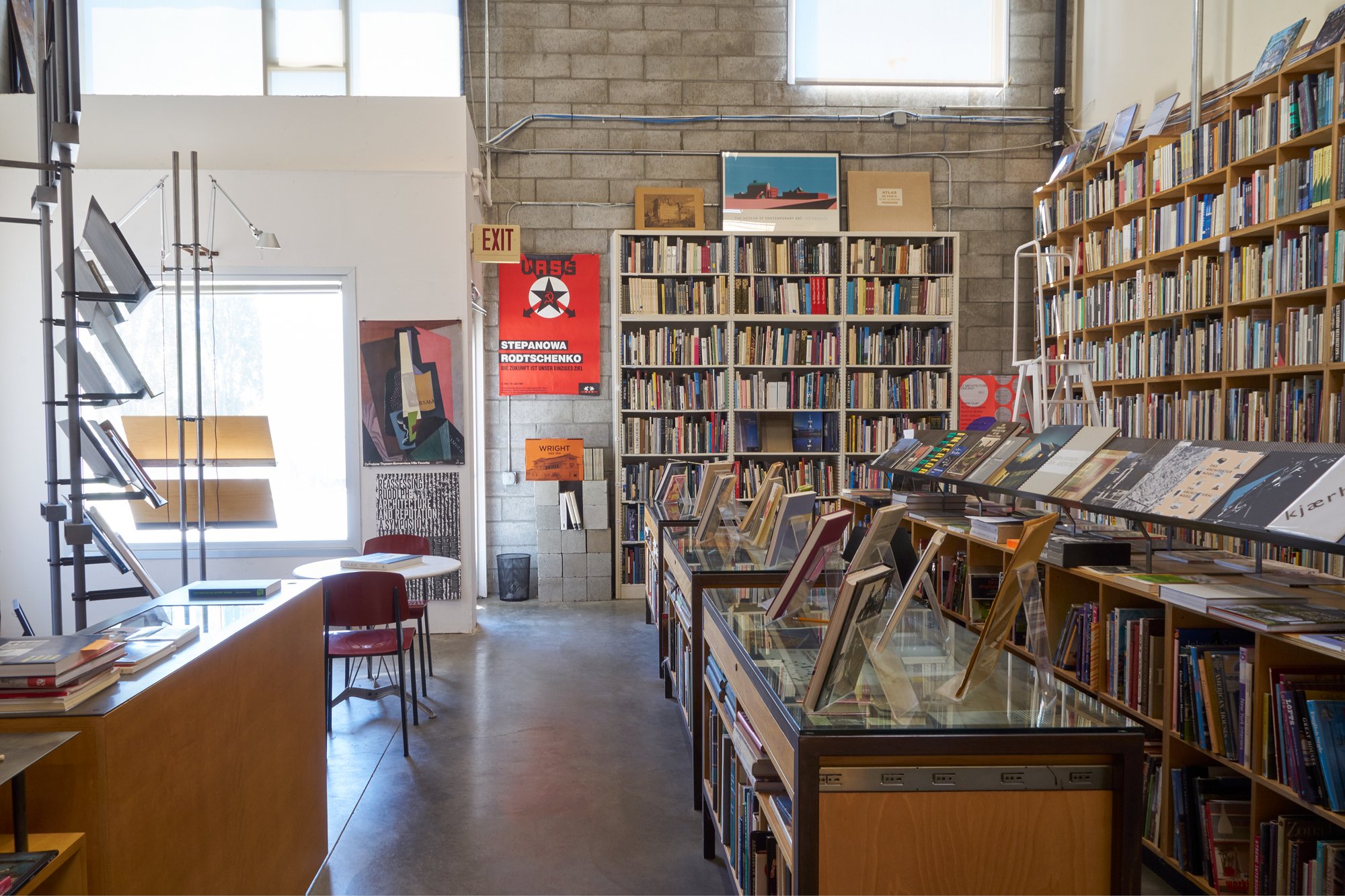 Interior of William Stout Architectural Books showing the counter and many bookshelves.